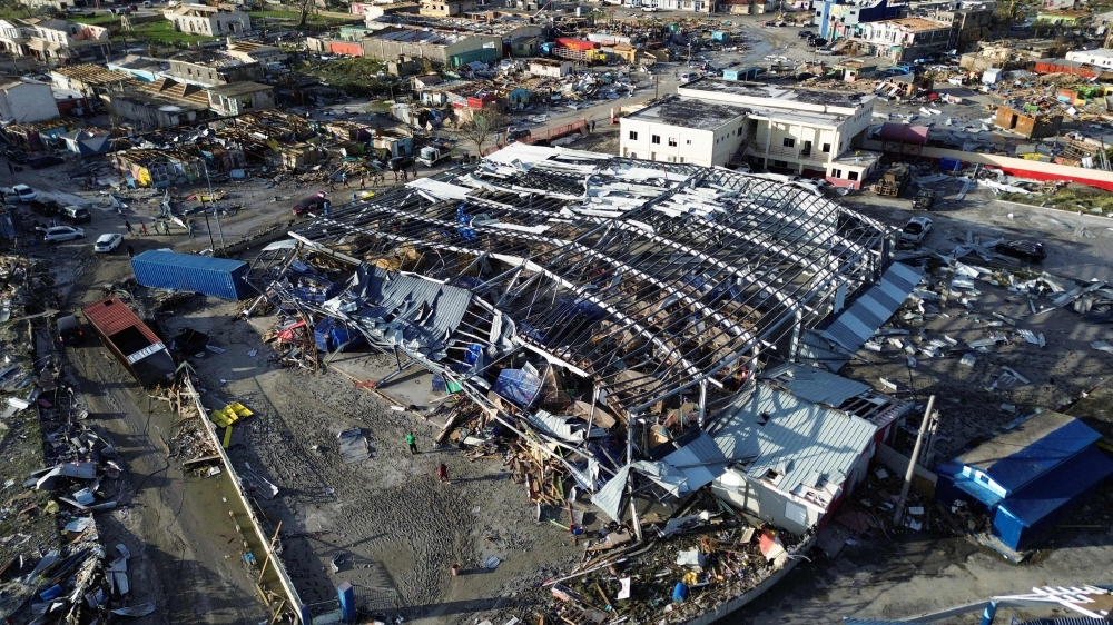 An aerial view of destroyed buildings following the passage of Hurricane Melissa, in Black River, St. Elizabeth, Jamaica on October 29, 2025. (Photo by Ricardo Makyn / AFP)

