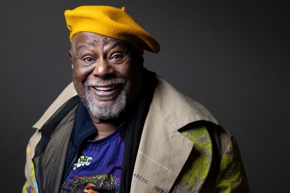 American singer, songwriter, and painter George Edward Clinton, poses during an exhibition of his paintings at the Galerie Mariane Ibrahim in Paris on October 23, 2025. (Photo by Joel Saget / AFP)