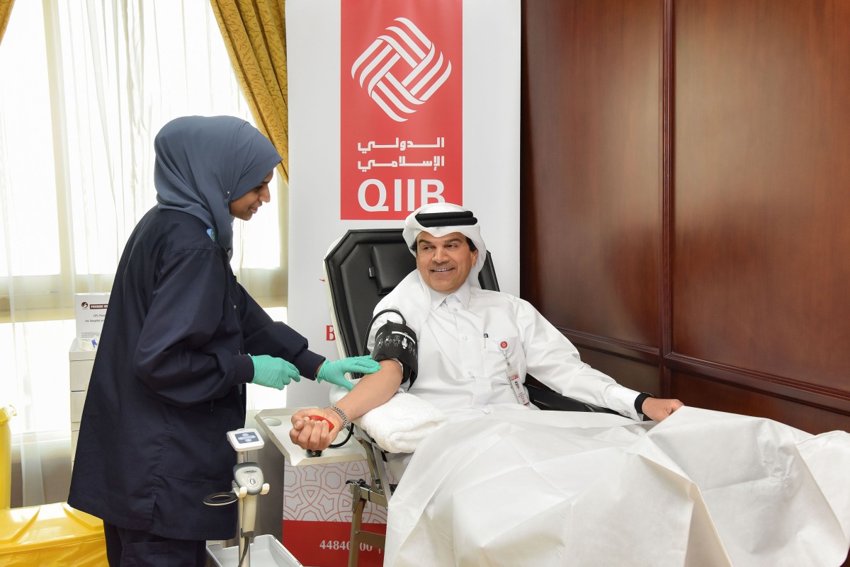 QIIB CEO, Dr. Abdulbasit Ahmad Al-Shaibei during the blood donation campaign