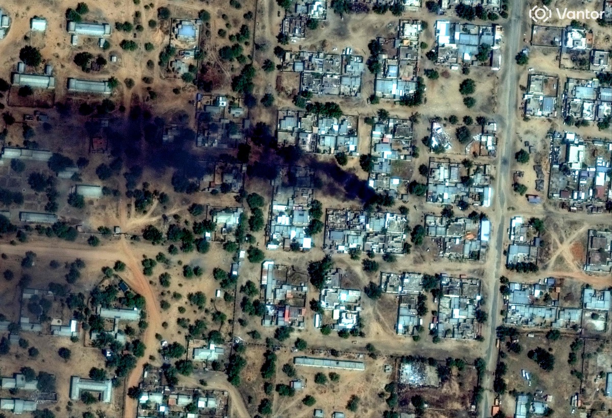 This handout satellite image by Vantor taken on October 26, 2025 and made available on October 31, 2025 shows smoke billowing from fires burning around El-Fasher Airport in El-Fasher. (Photo by Handout / Satellite image Vantor / AFP)

