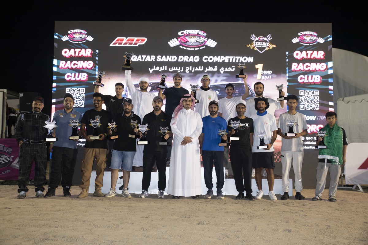 QRC Director Sheikh Jabor bin Khalid Al Thani with the podium winners.
