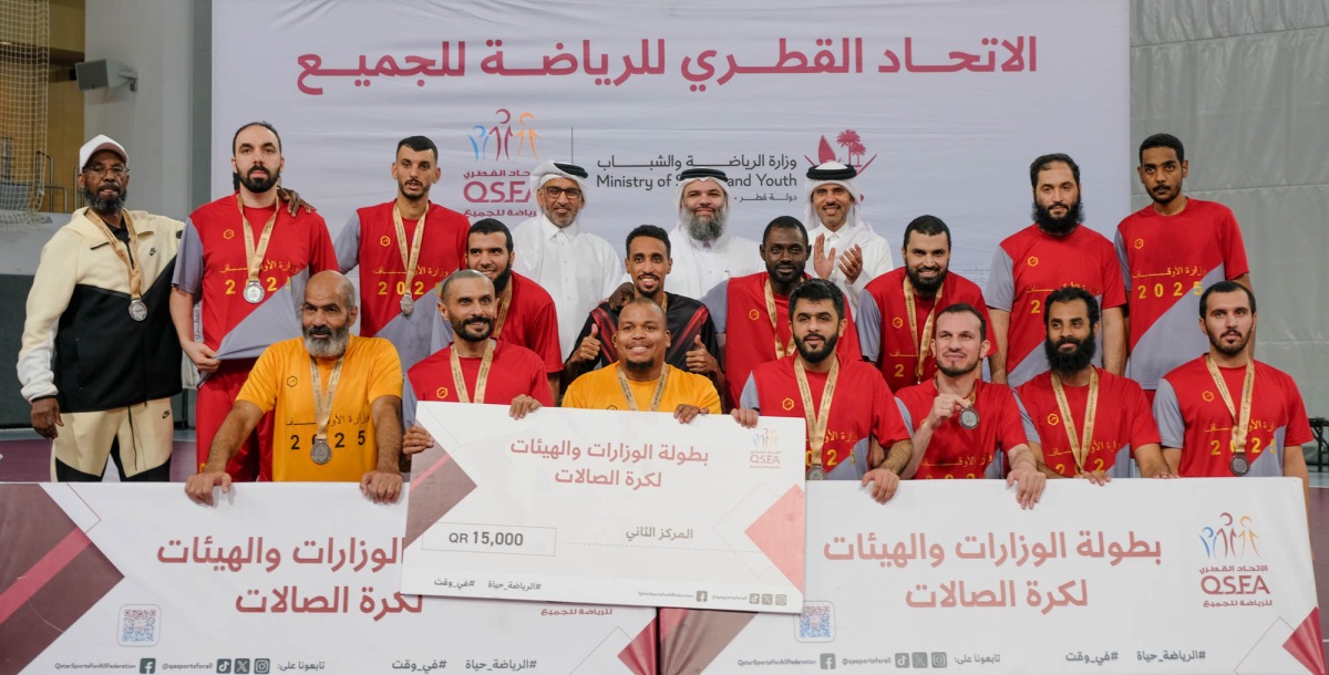 Undersecretary of the Ministry of Awqaf and Islamic Affairs H E Dr. Sheikh Khalid bin Mohammed bin Ghanem Al Thani with officials and members of Awqaf team during the awards ceremony. 