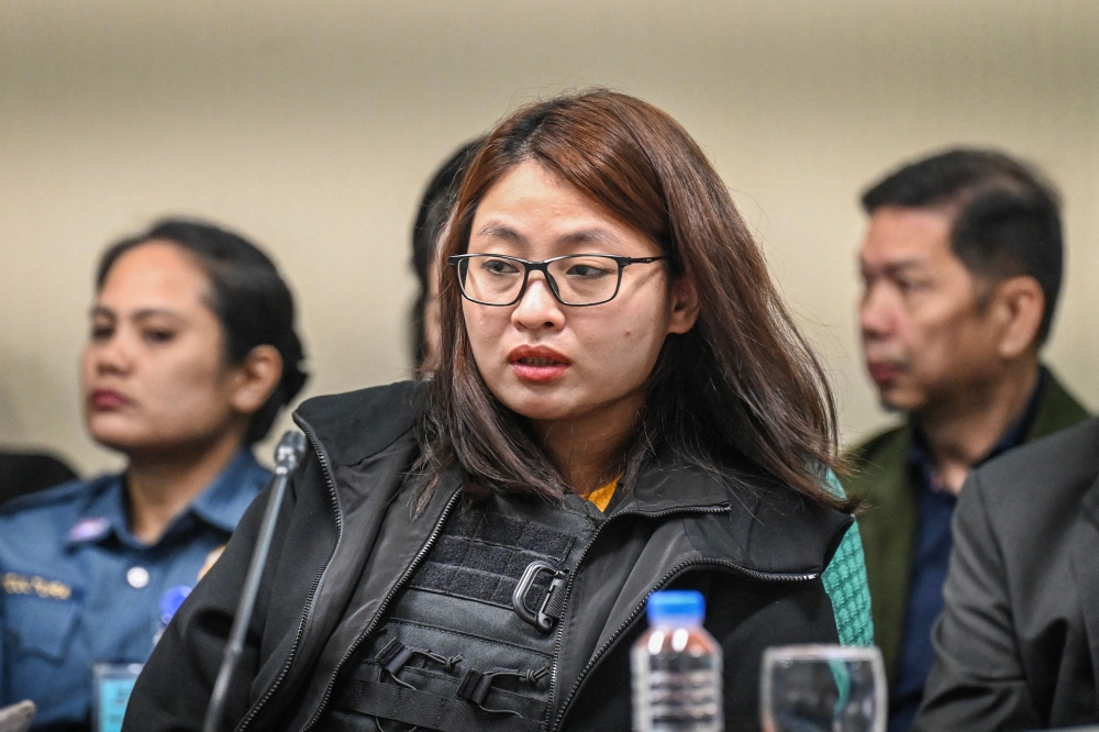 (Files) This file photo taken on September 9, 2024, shows Alice Guo, former mayor of Bamban in Philippines' Tarlac province, attending a hearing at the Senate in Manila. (Photo by Jam Sta Rosa / AFP)