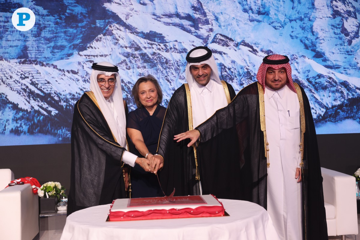 Minister of Transport H E Sheikh Mohammed bin Abdulla bin Mohammed Al Thani, Minister of State and President of Qatar National Library H E Dr. Hamad bin Abdulaziz Al Kawari, Director of the Department of Protocol at the Ministry of Foreign Affairs H E Ibrahim Yousif Abdullah Fakhro, and Ambassador of Switzerland to Qatar H E Florence Tinguely Mattli during the cake cutting ceremony at the event on Wednesday. PIC: Amr Diab/ The Peninsula