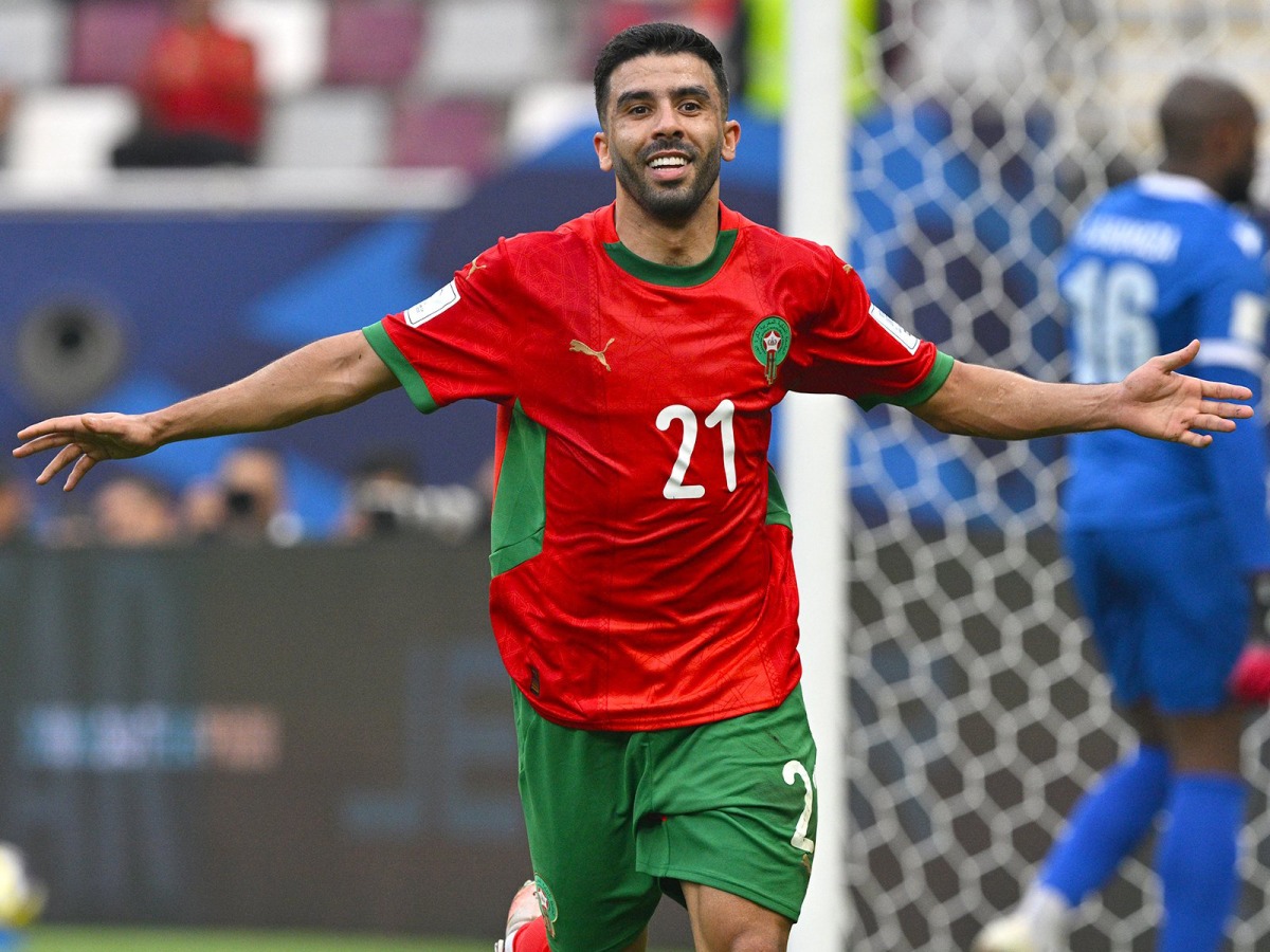 Morocco’s Karim El Berkaoui celebrates after scoring his team’s third goal. 