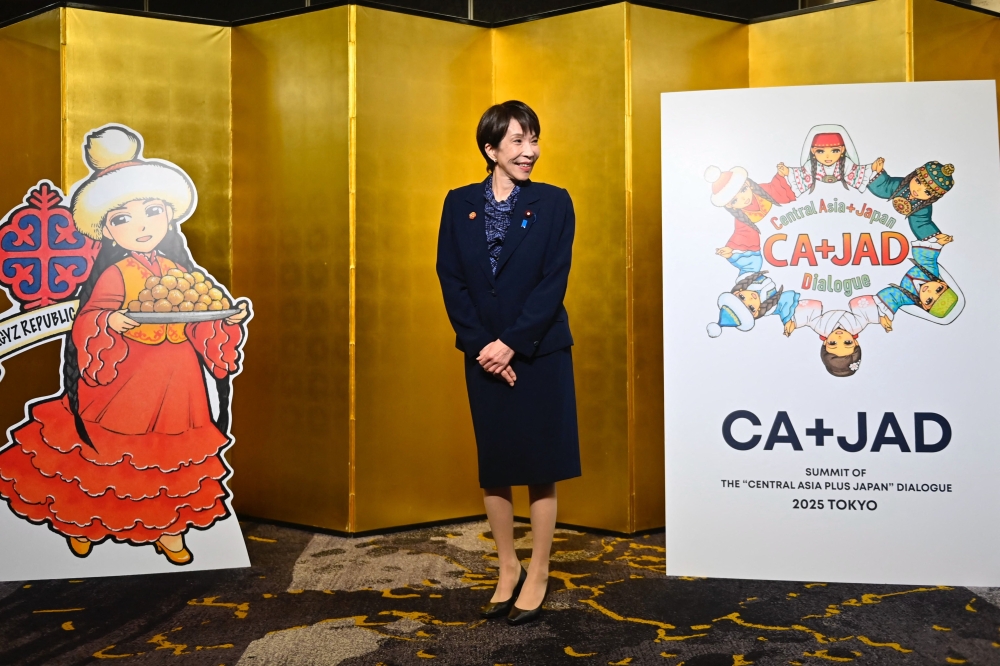 Japan's Prime Minister Sanae Takaichi prepares to welcome Kazakhstan's President Kassym-Jomart Tokayev at the leaders-level 