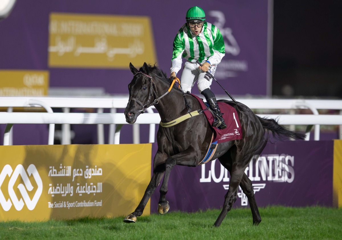 Jockey Soufiane Saadi gestures after guiding Aeon’s Aegis to victory. 