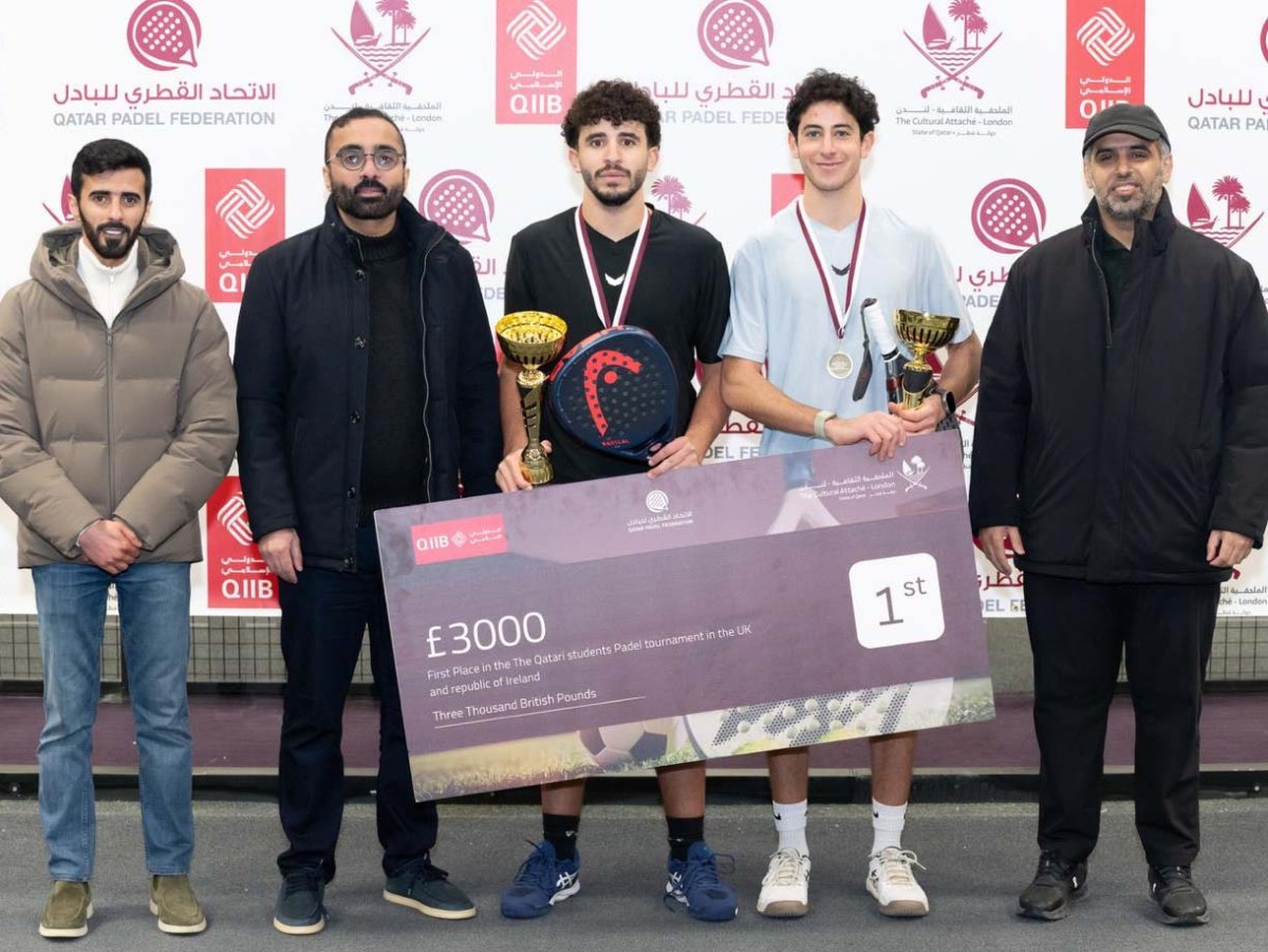Officials with the champions of the tournament.