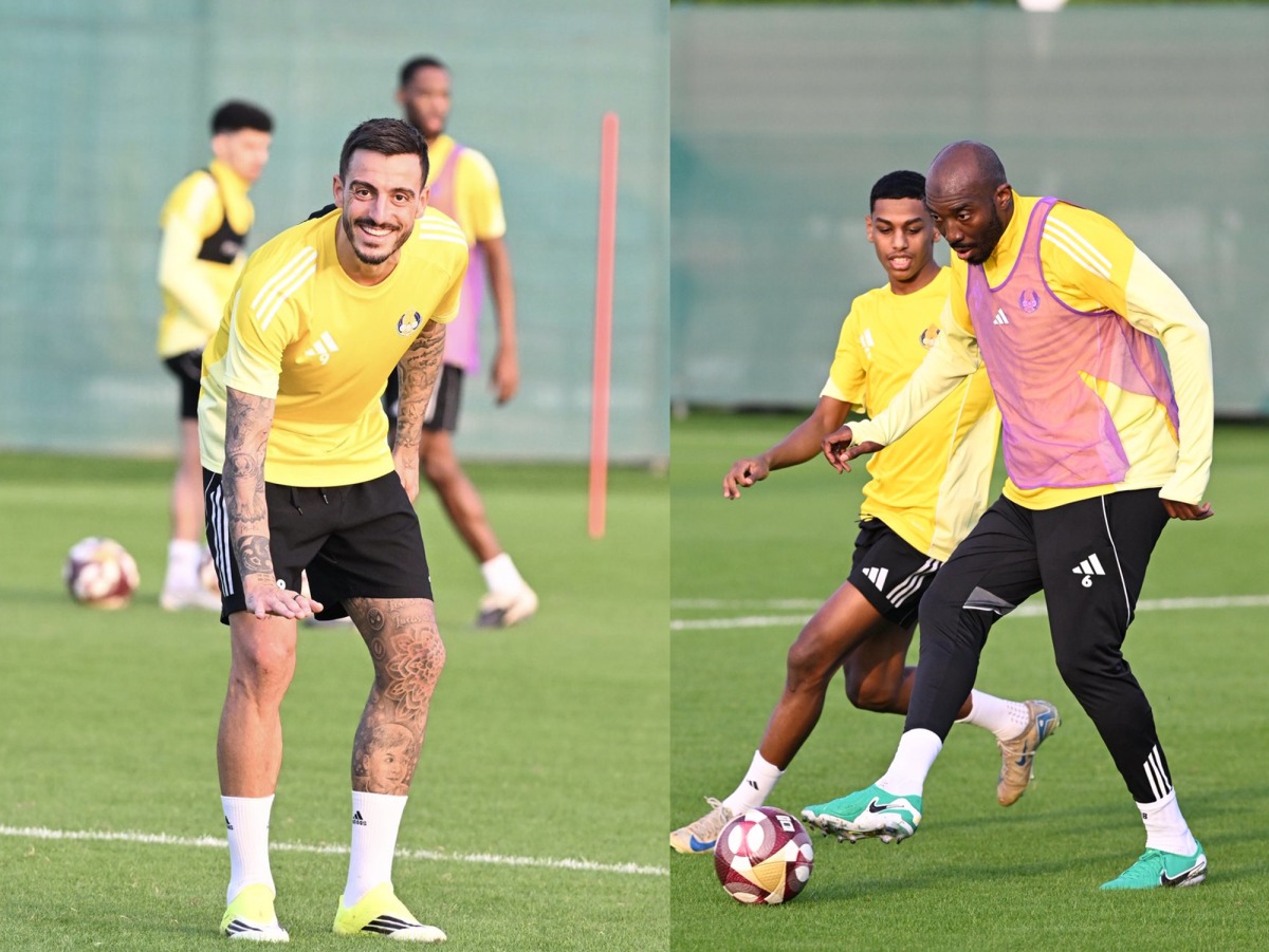 Al Gharafa’s Joselu (left) and teammates attend a training session.  