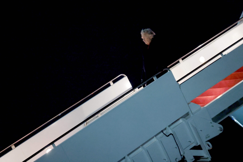 US President Donald Trump walks off Air Force One on January 19, 2026 in Joint Base Andrews, Maryland. Anna Moneymaker/Getty Images/AFP