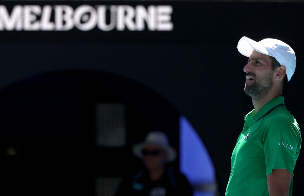 Serbia's Novak Djokovic looks on during his match against Italy's Francesco Maestrelli in Melbourne on January 22, 2026. Photo by David Gray / AFP