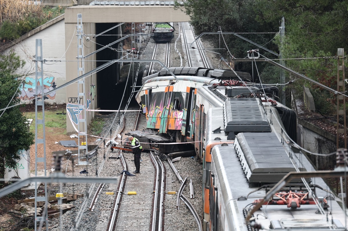 A picture taken on January 21, 2026 shows a regional service train the morning after it collided with a collapsed wall, killing one person and injuring seriously five, between Sant Sadurni d'Anoia and Gelida, near Barcelona.