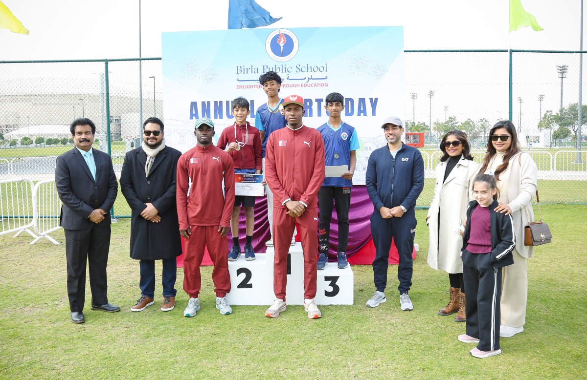 The Principal and other officials with winners during the prize distribution ceremony.