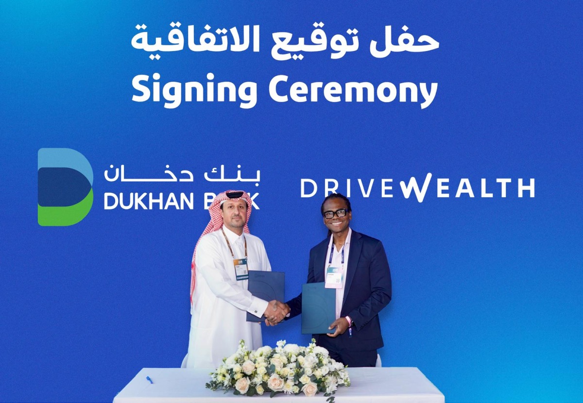 Dukhan Bank and DriveWealth officials during the signing ceremony.