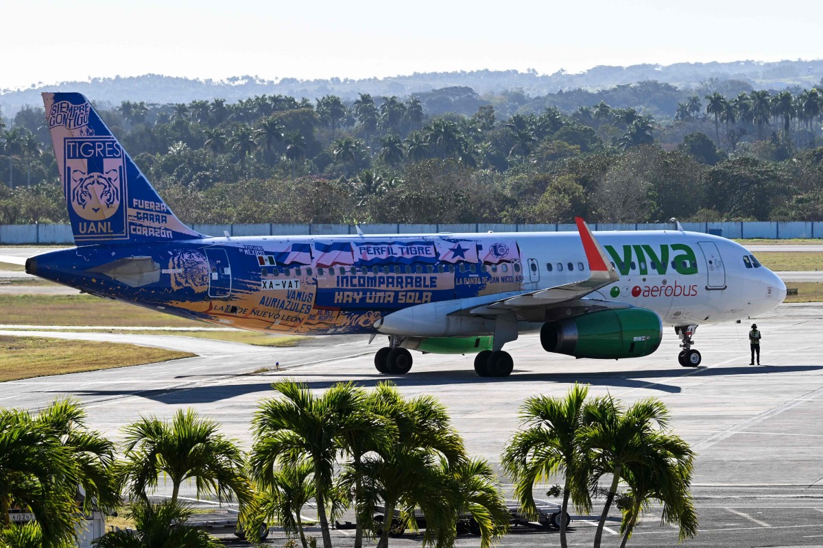 A Viva Aerobus plane plane takes taxis at Jose Marti International Airport in Havana on February 9, 2026. (Photo by YAMIL LAGE / AFP)
