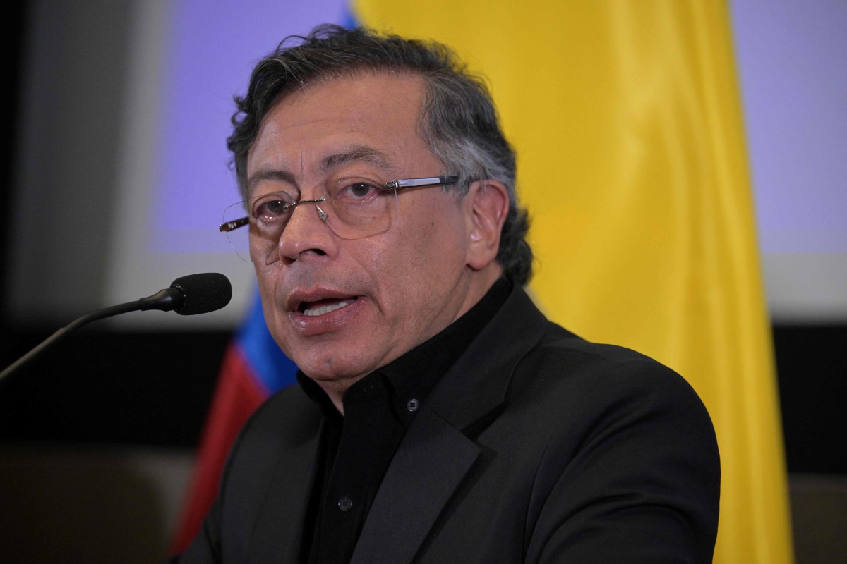 (FILES) Colombian President Gustavo Petro speaks during a press conference at the Colombian Embassy in Washington, DC, on February 3, 2026. (Photo by Oliver Contreras / AFP)