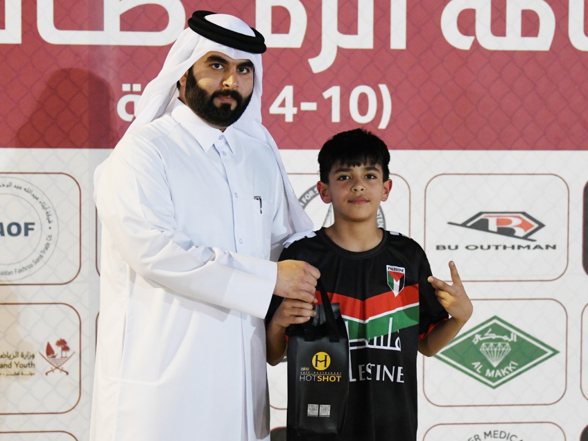 Zakaria Al Najjar of Palestine receives his Man of the Match award. 
