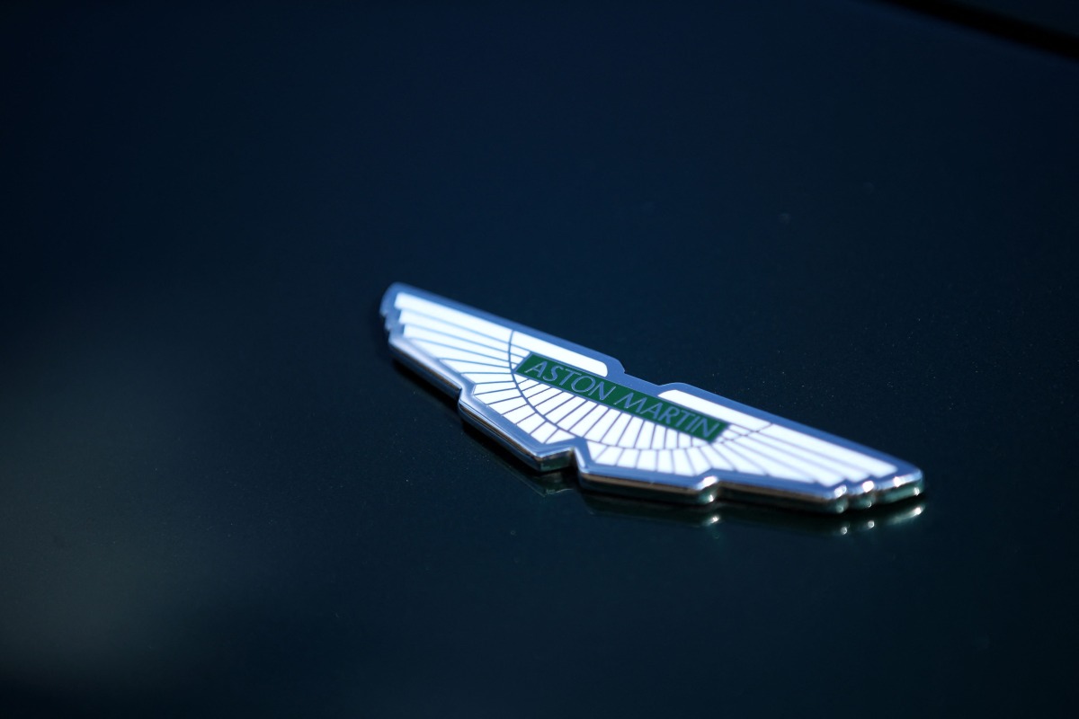 The Aston Martin emblem is pictured during the Concours of Elegance at Hampton Court Palace, south west of London on September 5, 2025. Photo by Rhianna Chadwick / AFP