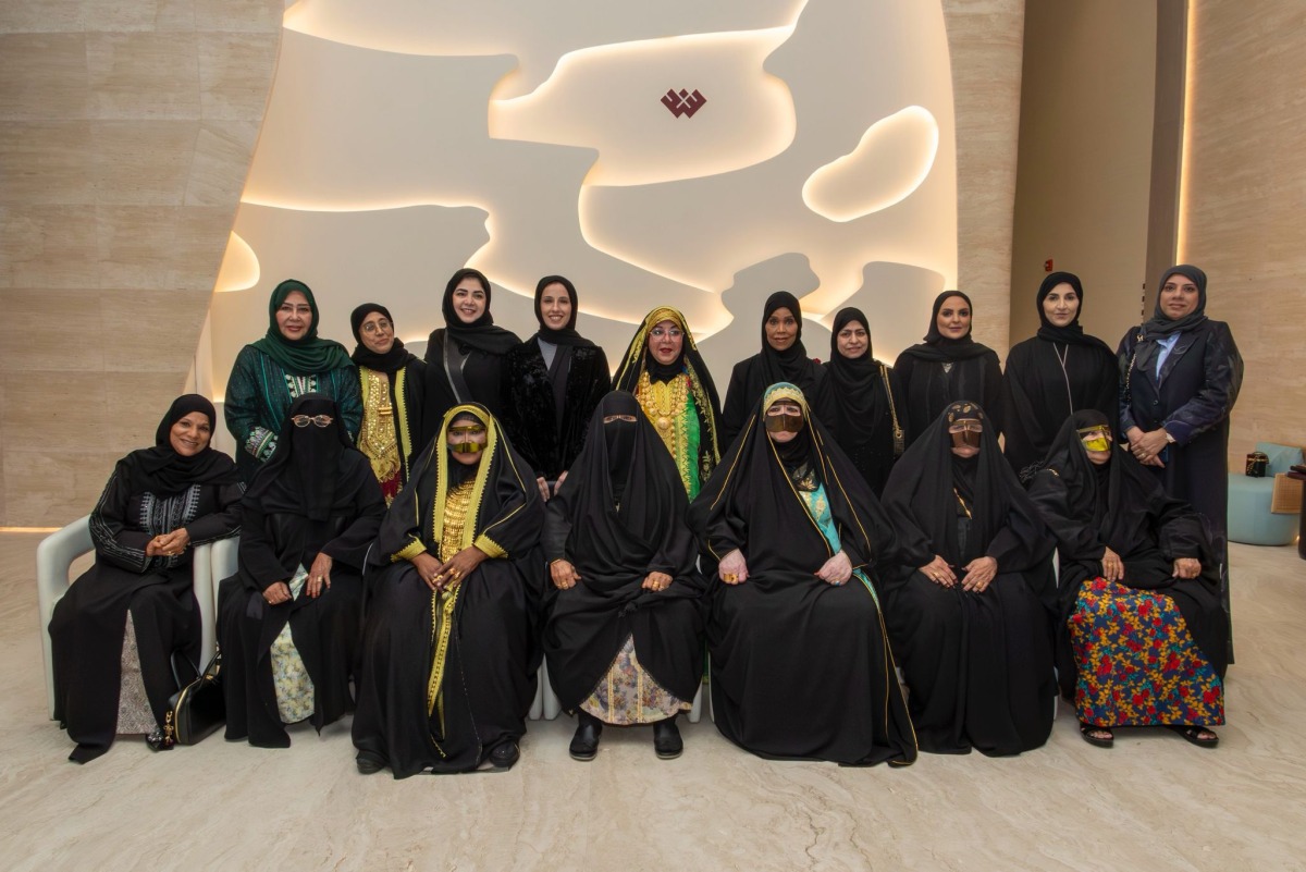 Minister of Social Development and Family H E Buthaina bint Ali Al Jabr Al Nuaimi with officials and members of Ehsan during the event.