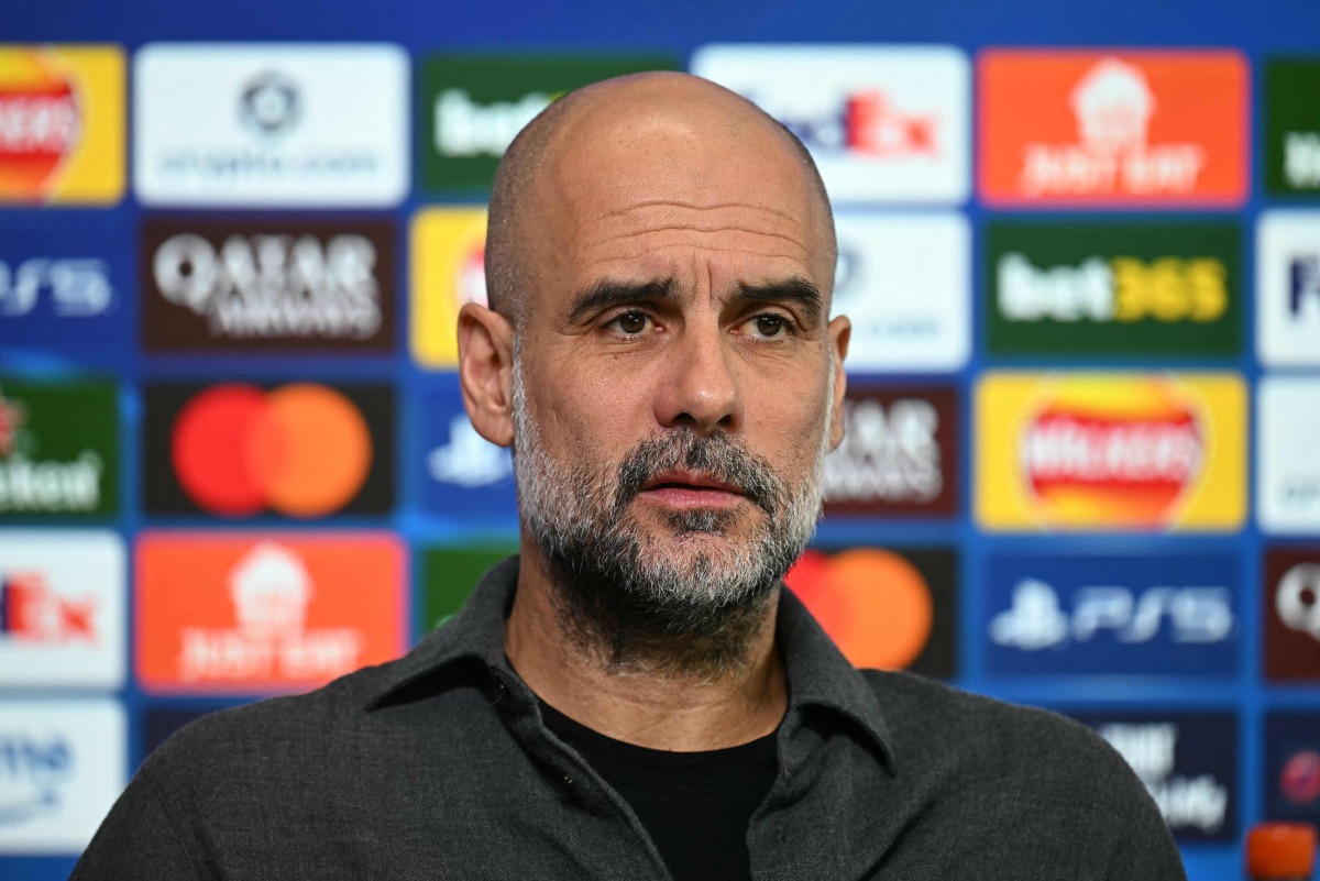 Manchester City's Spanish manager Pep Guardiola looks on during a press conference at the Etihad Campus training ground in Manchester, north-west England, on March 16, 2026, on the eve of their UEFA Champions League, Last 16, second-leg football match against Real Madrid. (Photo by Paul ELLIS / AFP)