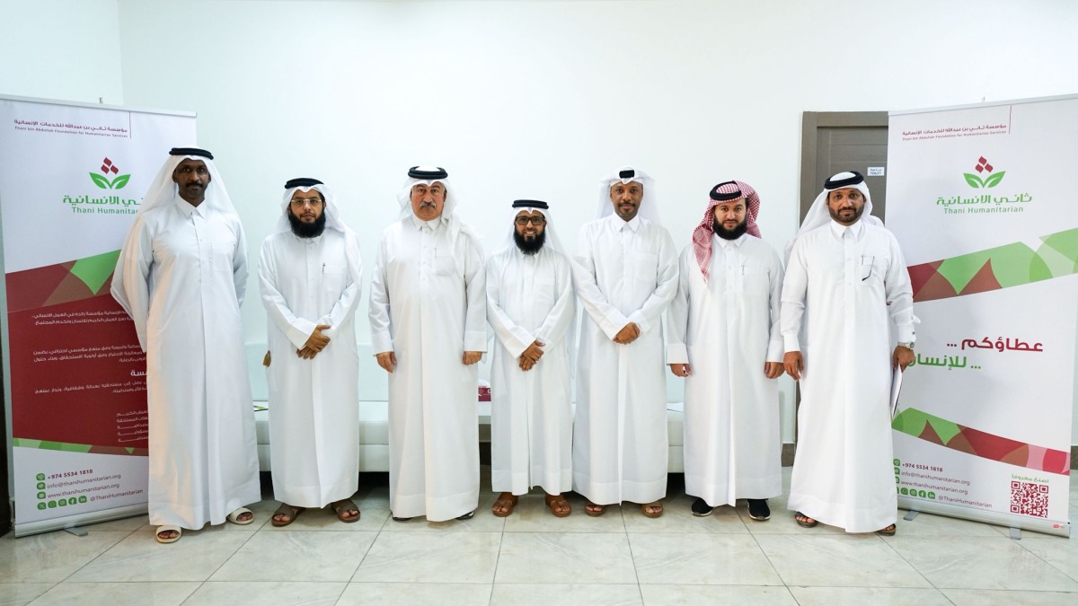 CEO of Thani Bin Abdullah Foundation for Humanitarian Services, Ayed bin Dabsan Al-Qahtani, with officials from the foundation's Gharimin Committee.