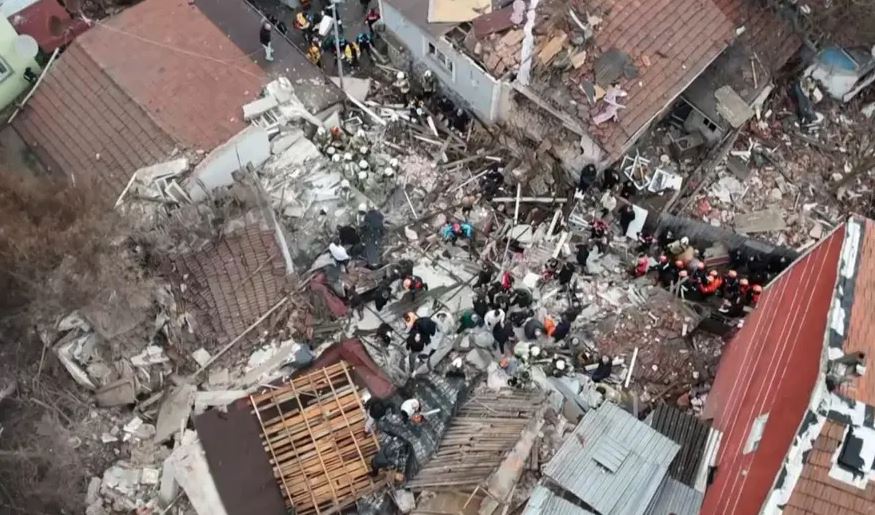 Screengrab of the wreckage of the collapsed buildings as viewed from the air ( NTV)