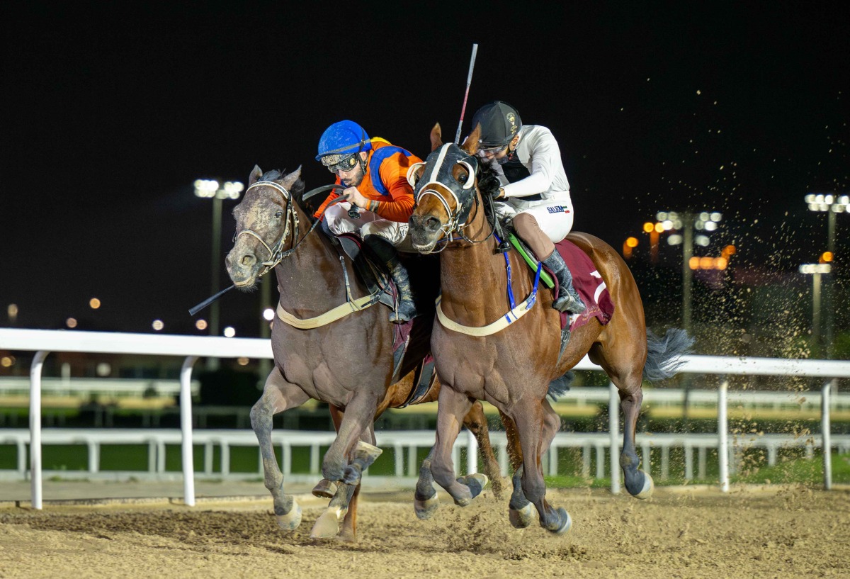 Marco Casamento  and Dubawi Spectre (left) on their way to win Al Jassasiya Cup ahead of Thor's Hammer, ridden by  Salem Alajmi. PIC: JUHAIM/QREC 