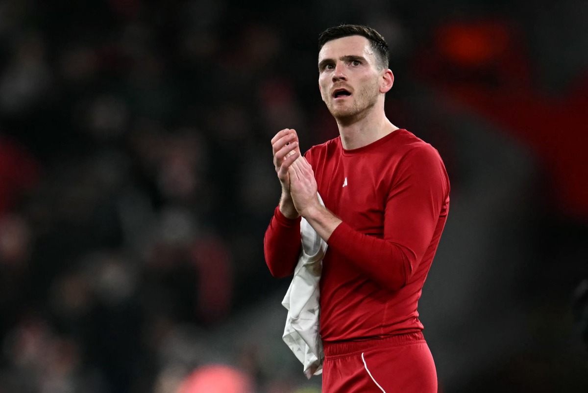 Liverpool's Scottish defender #26 Andrew Robertson applauds the fans following the UEFA Champions League football match between Liverpool and Qarabag at Anfield in Liverpool, north west England on January 28, 2026. Photo by Paul ELLIS / AFP