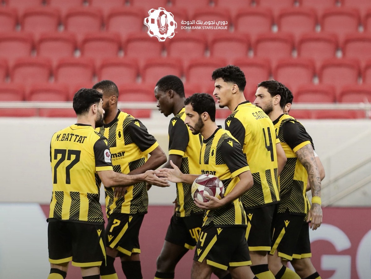 Qatar SC players celebrate a goal against Al Shamal.