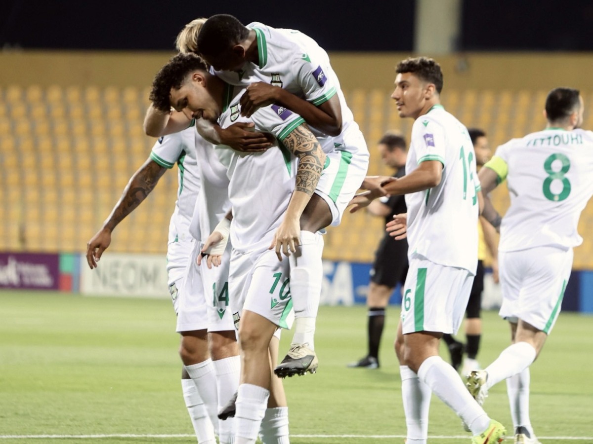 Al Ahli players celebrate during the quarter-final against Al Hussein on Sunday.