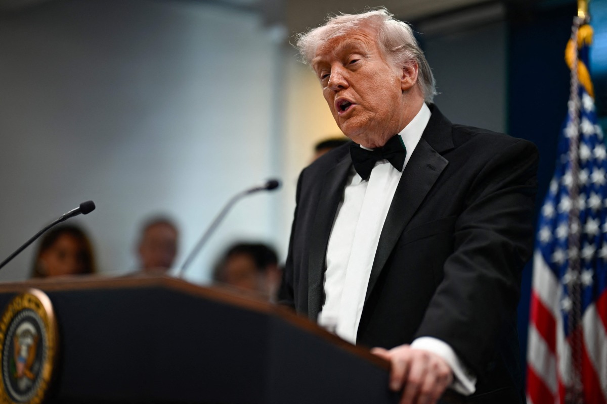 US President Donald Trump speaks during a press briefing in the Brady Briefing Room at the White House in Washington, DC, shortly after a shooting incident at the White House Correspondents’ Dinner on April 25, 2026. (Photo by Kent NISHIMURA / AFP)
