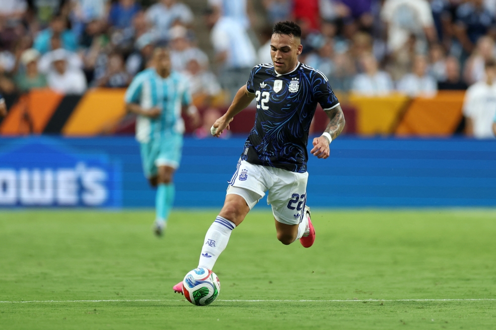 Lautaro Martinez of Argentina runs with the ball during the international friendly match between Argentina and Honduras at Kyle Field on June 06, 2026 in College Station, Texas. Tim Warner/Getty Images/AFP