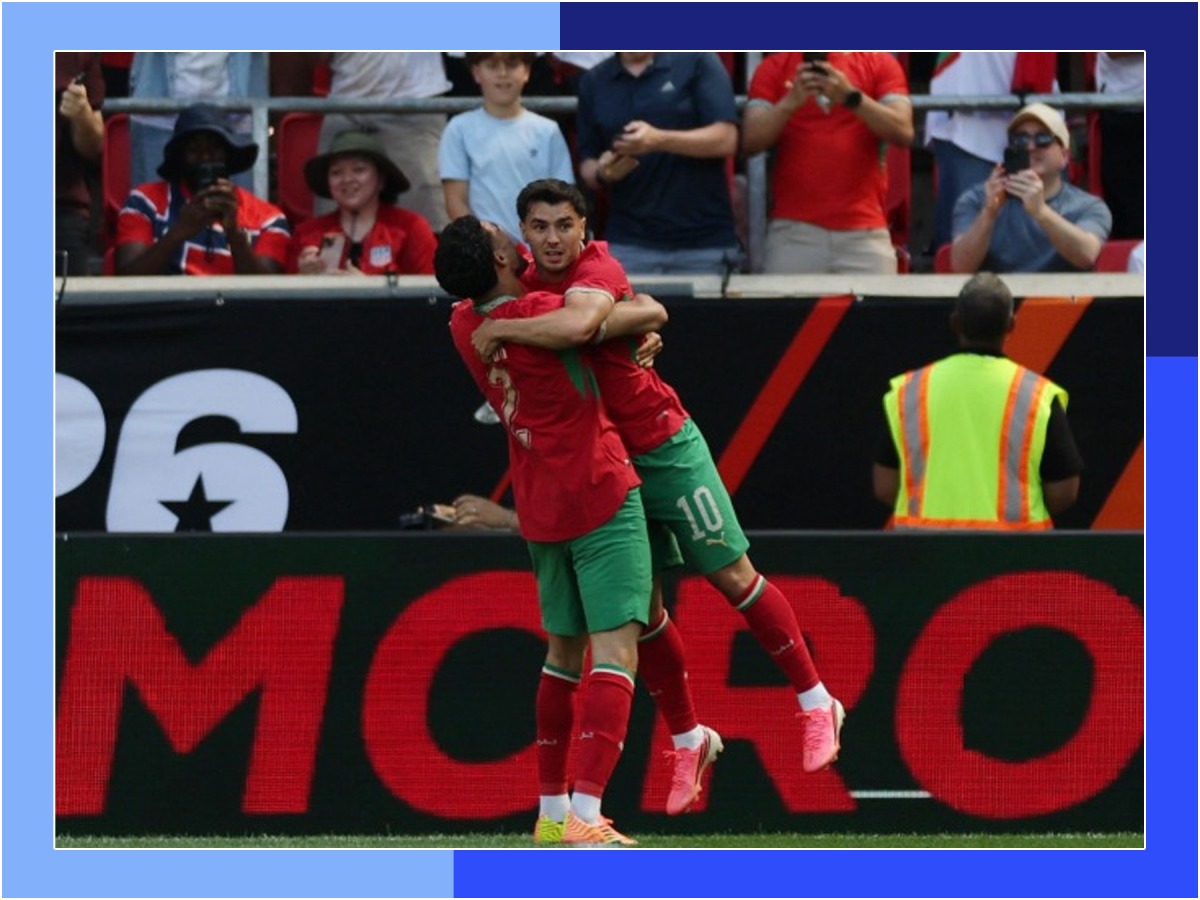 Morocco's Brahim Diaz celebrates with teammate Achraf Hakimi after scoring a goal against Norway during a friendly match on Sunday. (AFP)