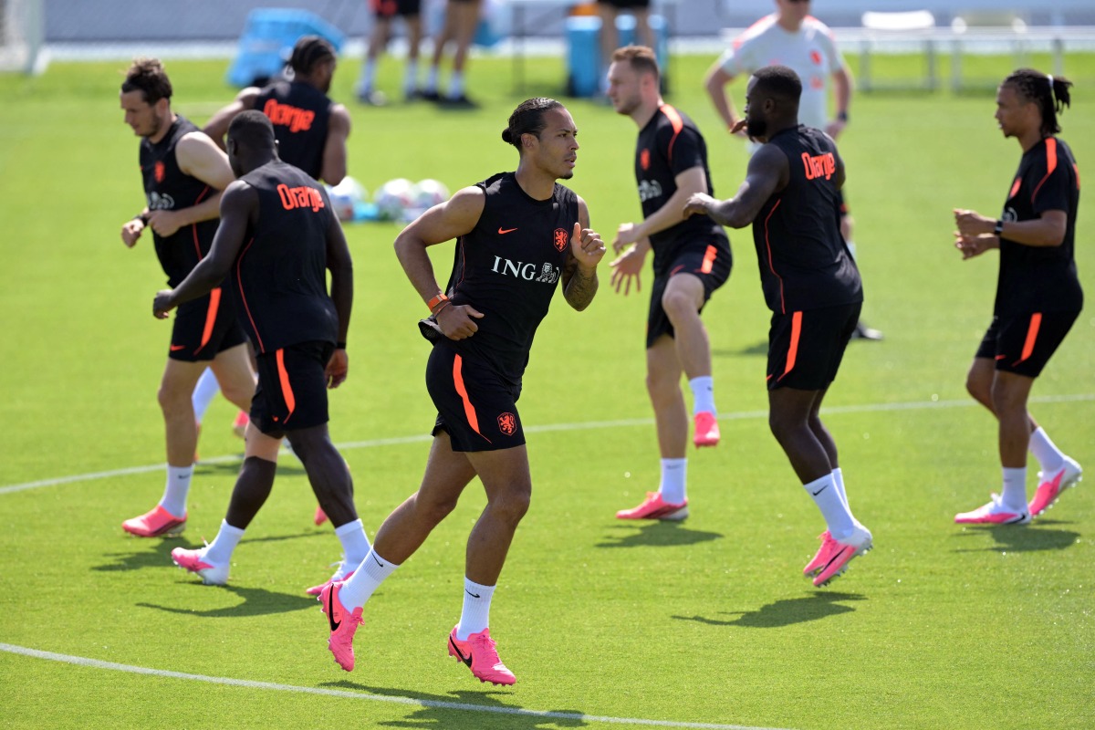 Netherlands’ Virgil van Dijk with teammates during a training session ahead of the match against Japan.