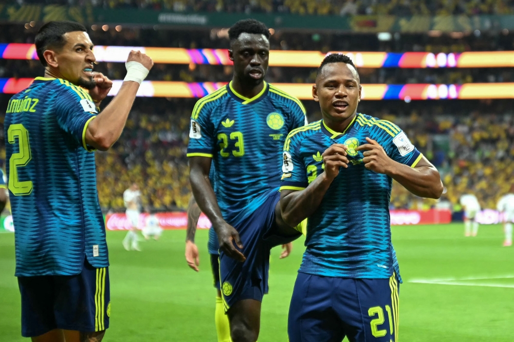 Colombia's midfielder #21 Jaminton Campaz (R) celebrates scoring his team's third goal during the 2026 World Cup Group K football match between Uzbekistan and Colombia at the Mexico City Stadium in Mexico City on June 17, 2026. (Photo by Yuri Cortez / AFP)