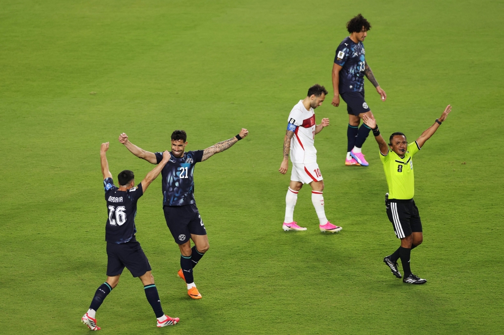 Alexandro Maidana #26 and Gabriel Avalos #21 of Paraguay celebrate after the 1-0 win in Santa Clara, California. Stu Forster/Getty Images/AFP