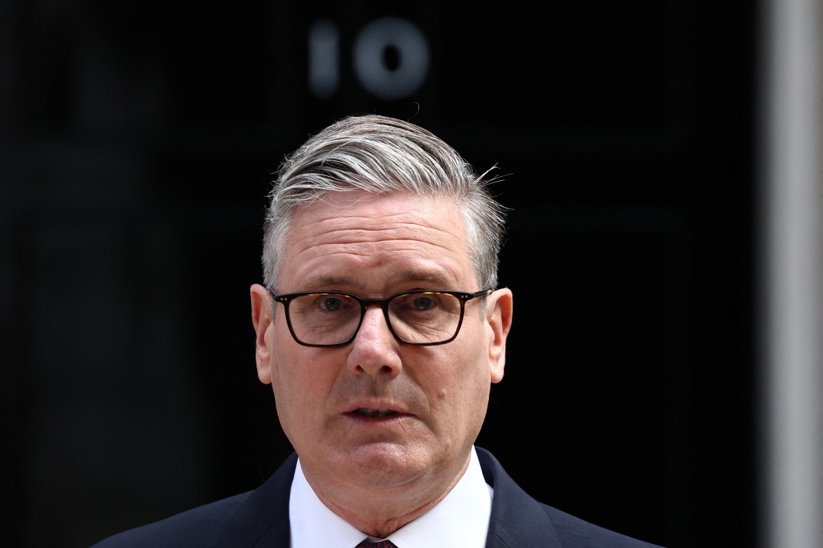 Britain's Prime Minister Keir Starmer makes a statement on his future outside 10 Downing Street on the morning of June 22, 2026, in London. Photo by Henry Nicholls / AFP
