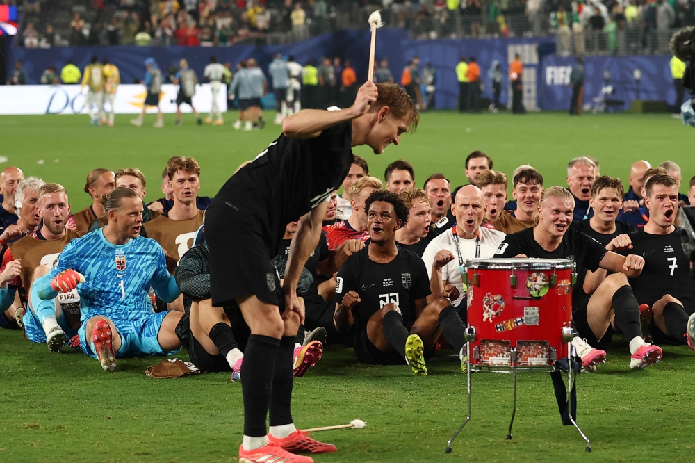 Norway's players celebrate after winning the 2026 World Cup Group I football match between Norway and Senegal at the New York/New Jersey Stadium in East Rutherford on June 22, 2026. (Photo by Charly Triballeau/ AFP)