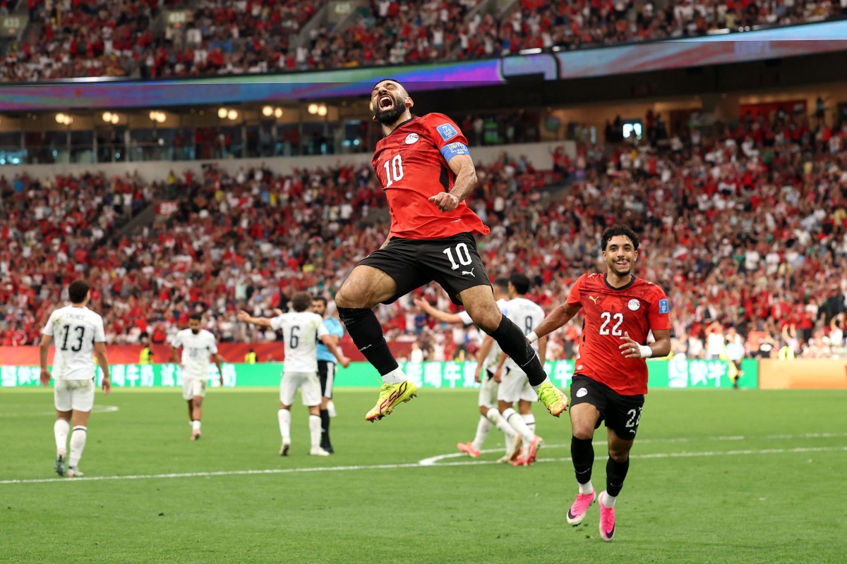 Mohamed Salah celebrates after scoring Egypt's second goal. (AFP)