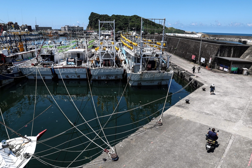 Fishing boats are secured at Shen'ao Harbour ahead of the arrival of Typhoon Bavi, in New Taipei City on July 9, 2026. (Photo by I-Hwa Cheng / AFP)
