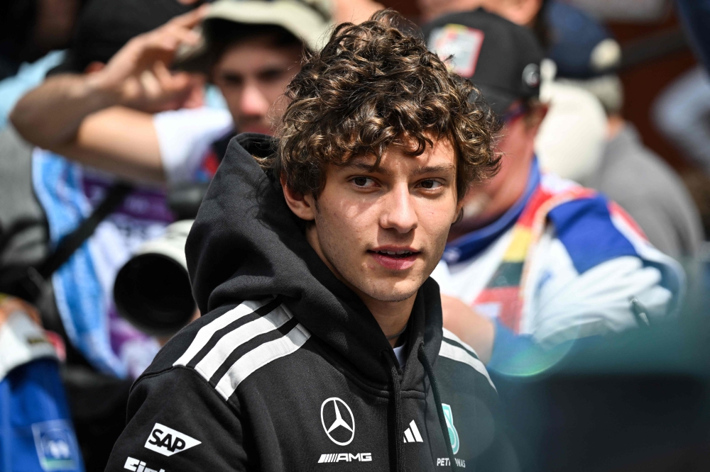 Mercedes' Italian driver Kimi Antonelli reacts as he takes part in the drivers parade ahead of the Formula One Belgian Grand Prix at the Spa-Francorchamps circuit, in Spa, on July 19, 2026. (Photo by Andrej Isakovic/ AFP)