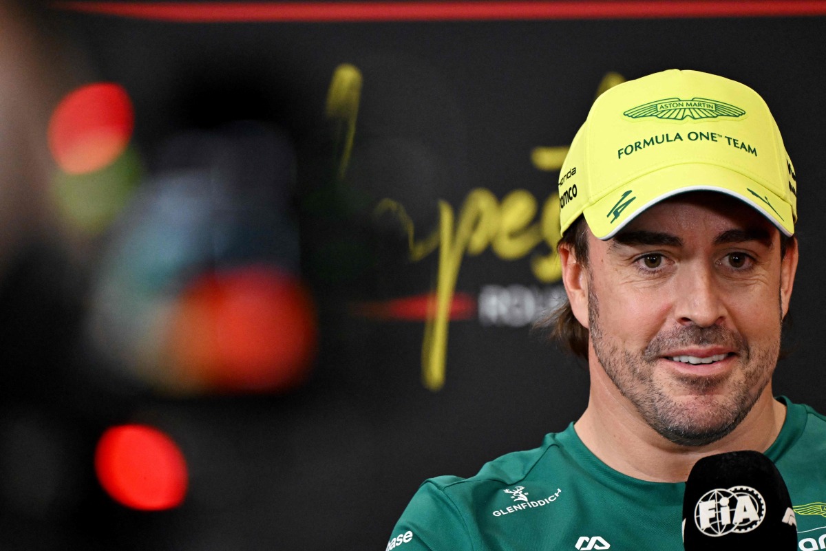 Aston Martin's Spanish driver Fernando Alonso addresses the press conference ahead of the Formula One Hungarian Grand Prix at the Hungaroring circuit in Mogyorod near Budapest, Hungary, on July 23, 2026. (Photo by Attila KISBENEDEK / AFP)