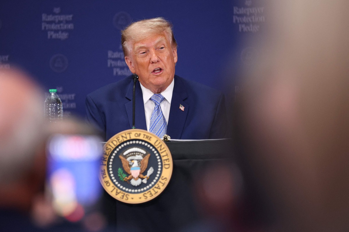 U.S. President Donald Trump delivers remarks on the Ratepayer Protection Pledge during a roundtable at the Environmental Protection Agency headquarters on July 23, 2026 in Washington, DC.(Photo by Kevin Dietsch / GETTY IMAGES NORTH AMERICA / Getty Images via AFP)
