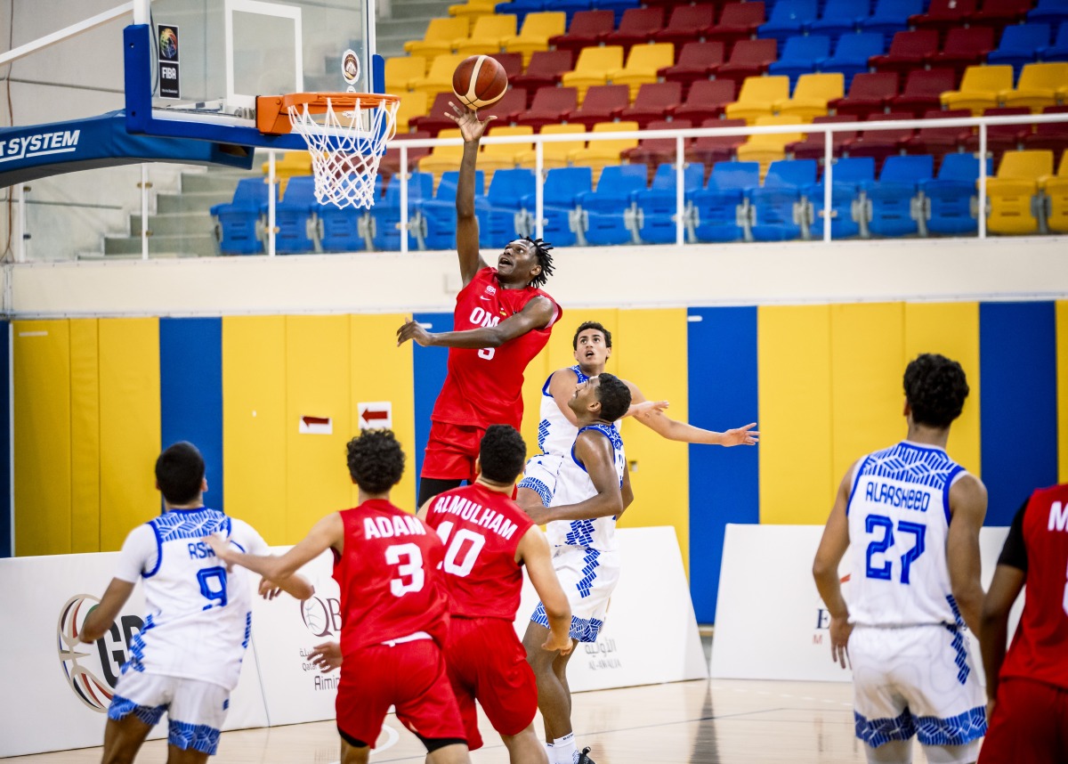 Action during the match between Oman and Kuwait.
