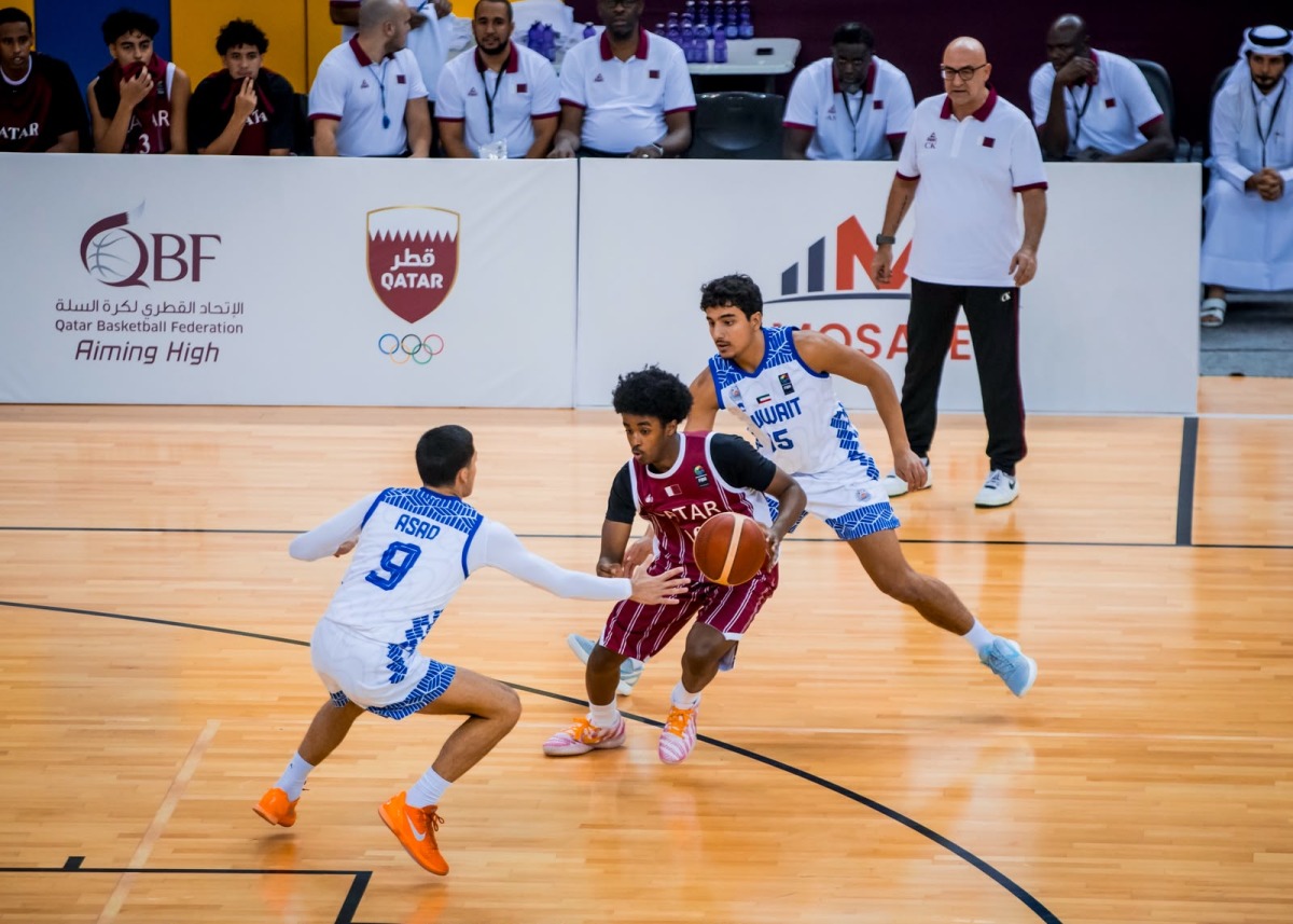 Action during the match between Qatar and Kuwait. 