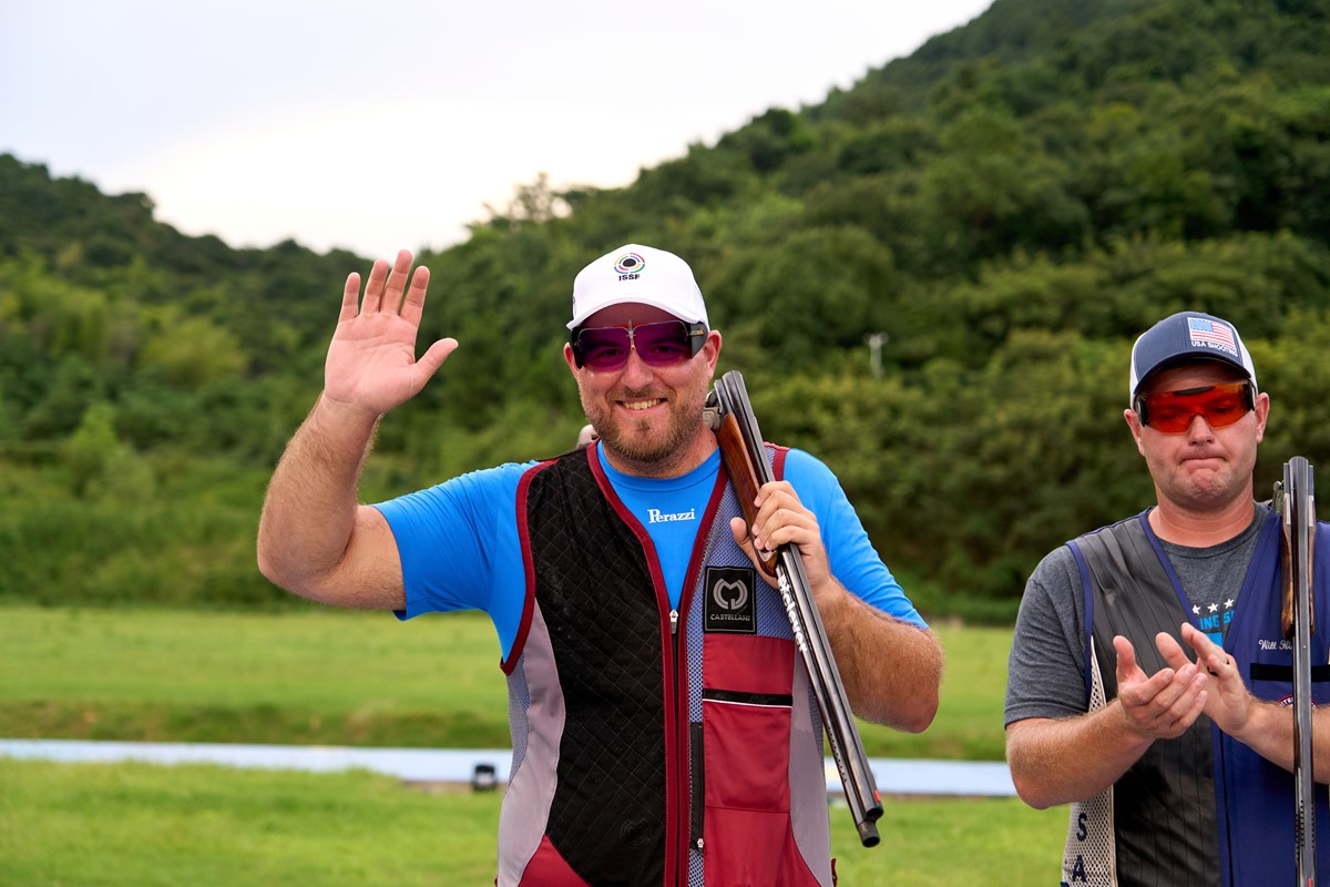 Qatar's Angelo Scalzone (left) celebrates after winning the silver medal.