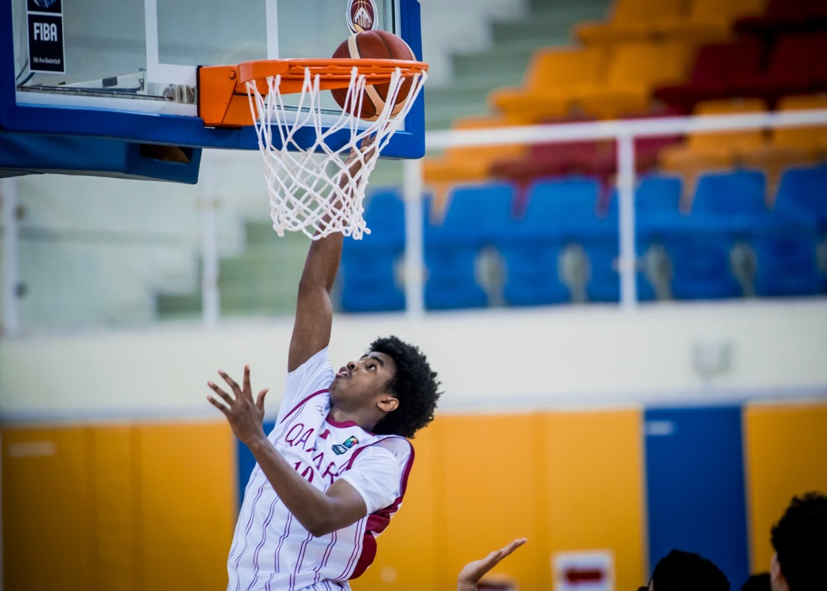 Qatar's Abdullah Yassin goes for a basket