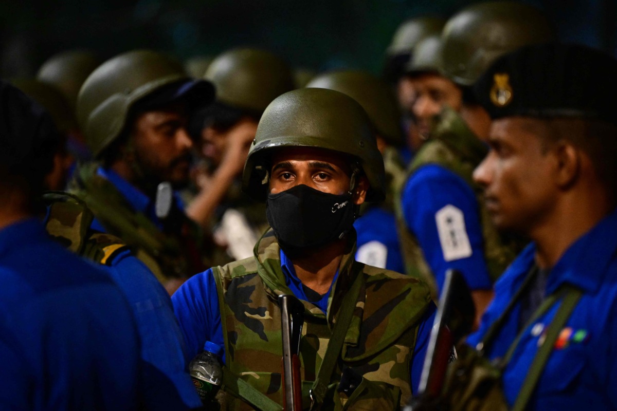 Sri Lanka Navy soldiers take up positions outside Sri Lanka's main Welikada Prison in the capital Colombo on August 7, 2026, following reports that some prisoners were staging a protest inside. Photo by Ishara S. KODIKARA / AFP