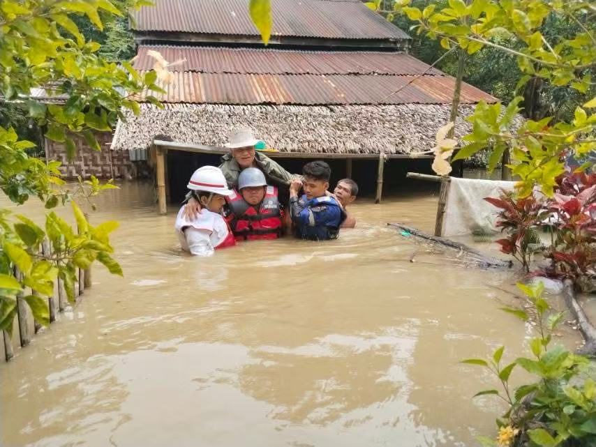 Rescuers evacuate residents in Laymyethna township in Ayeyarwady region, Myanmar, Aug. 1, 2026. (Myanmar Fire Services Department/Handout via Xinhua)