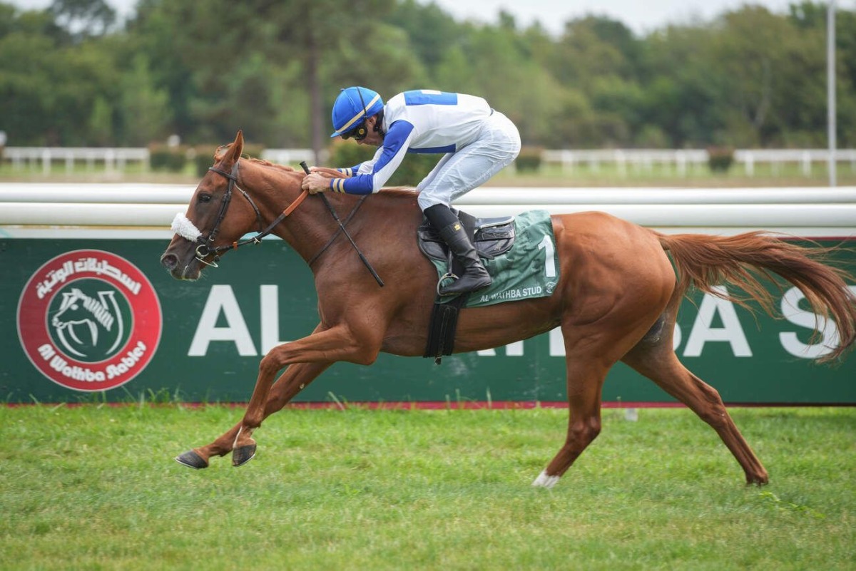 Jockey Alexandre Gavilan guides Fakhira towards the finish line. 
